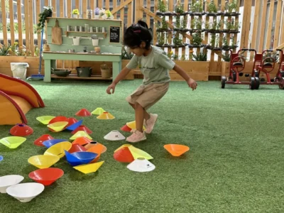Toddler doing physical Activity at our Deira Nursery